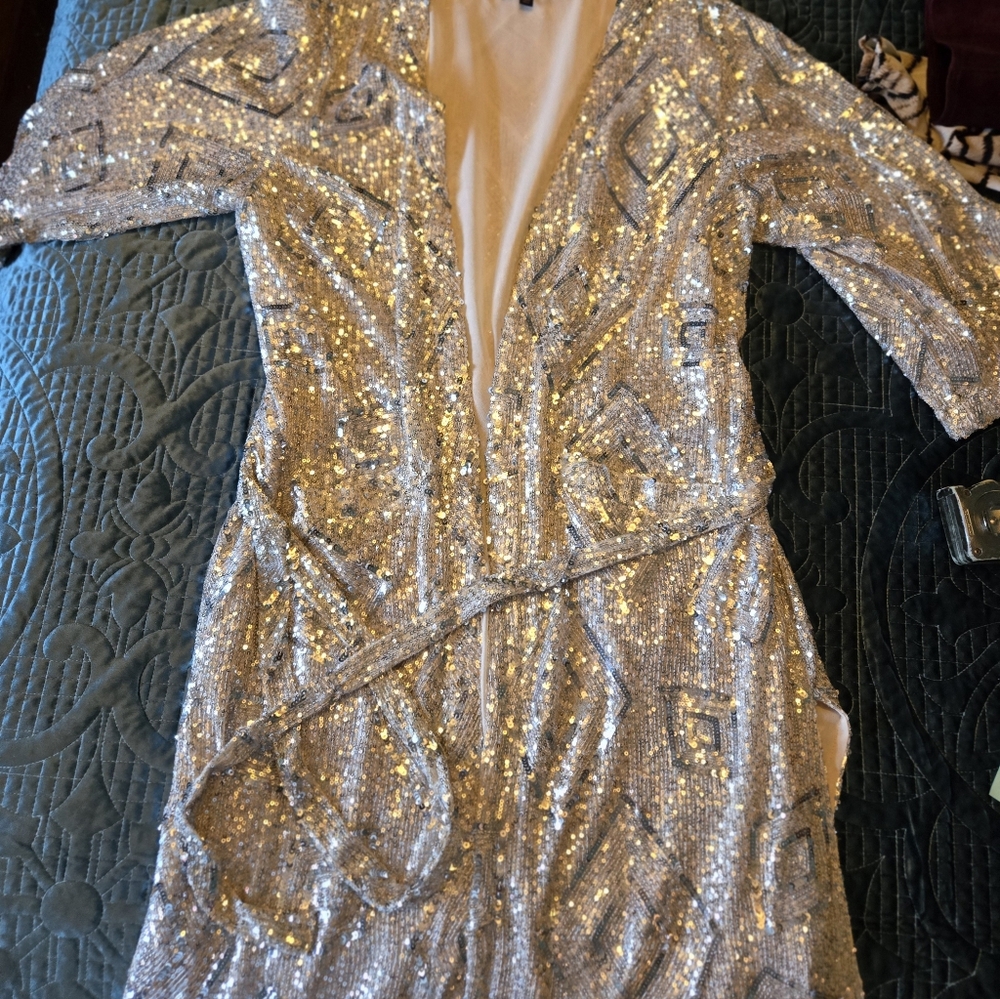 Sparkling jacket to wear over formal dresses or anything special.